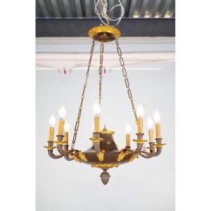 Lustre Restauration à neuf lumières en bronze patiné et doré, vers 1815