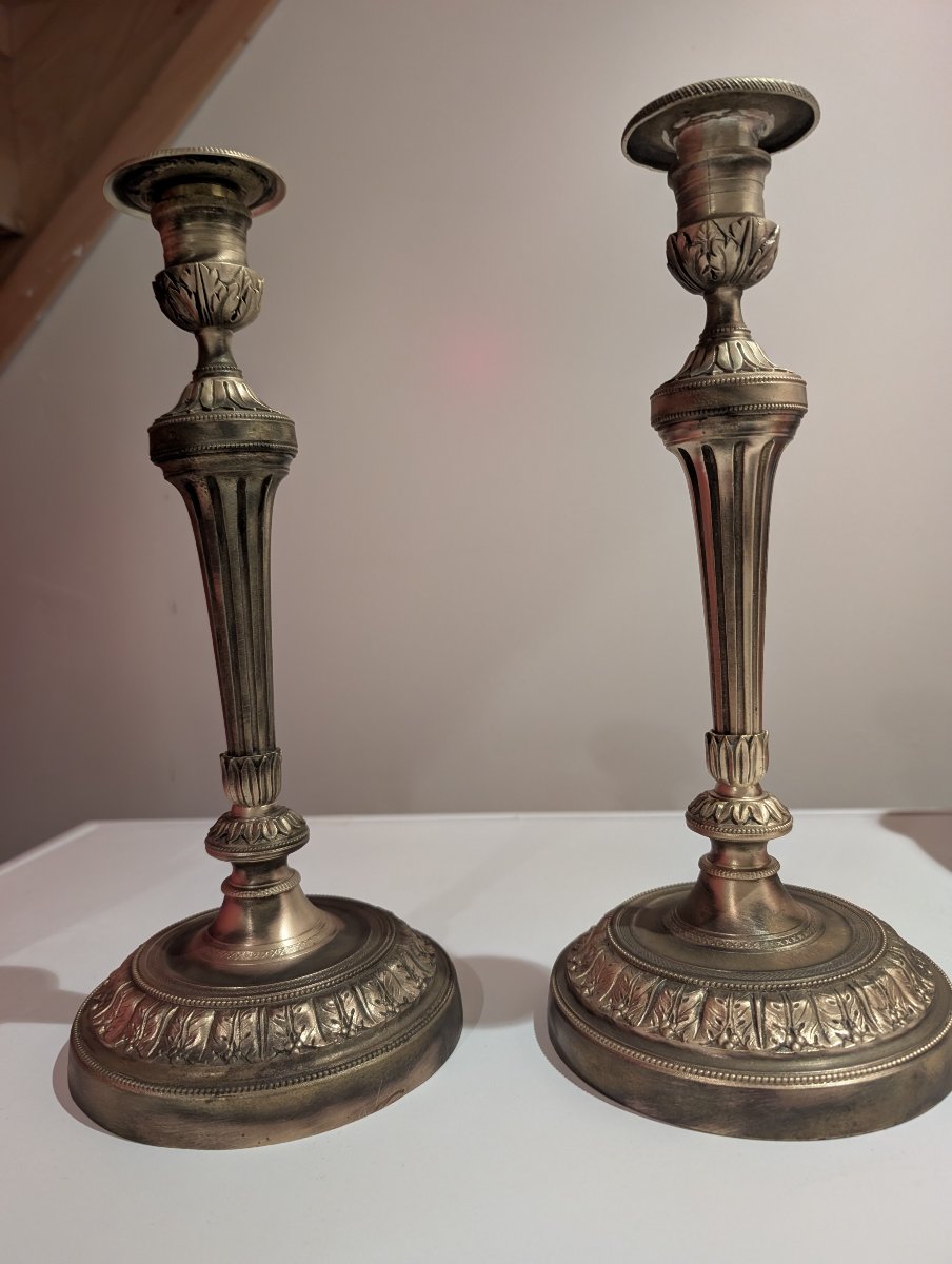 Pair Of Chiseled Bronze Candlesticks In The Louis XVI Style