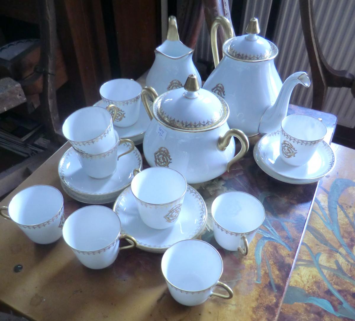 A Limoges Porcelain Coffee Service Monogram