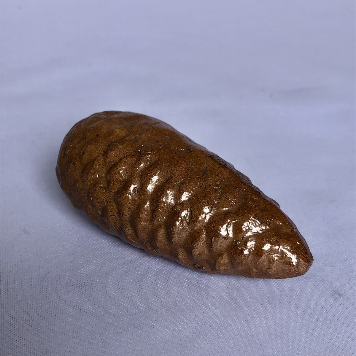 Secouette en forme de pomme de pin - Manufacture HB Grande maison - Bretagne 