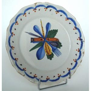 Assiette aux couverts et panais - manufacture de Nevers