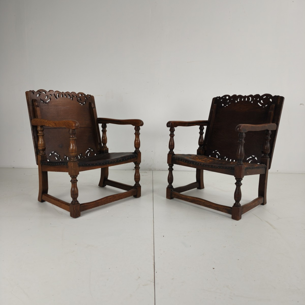 Pair Of Antique English Jacobean Monk's Armchairs And Tables, By F. Parker & Sons
