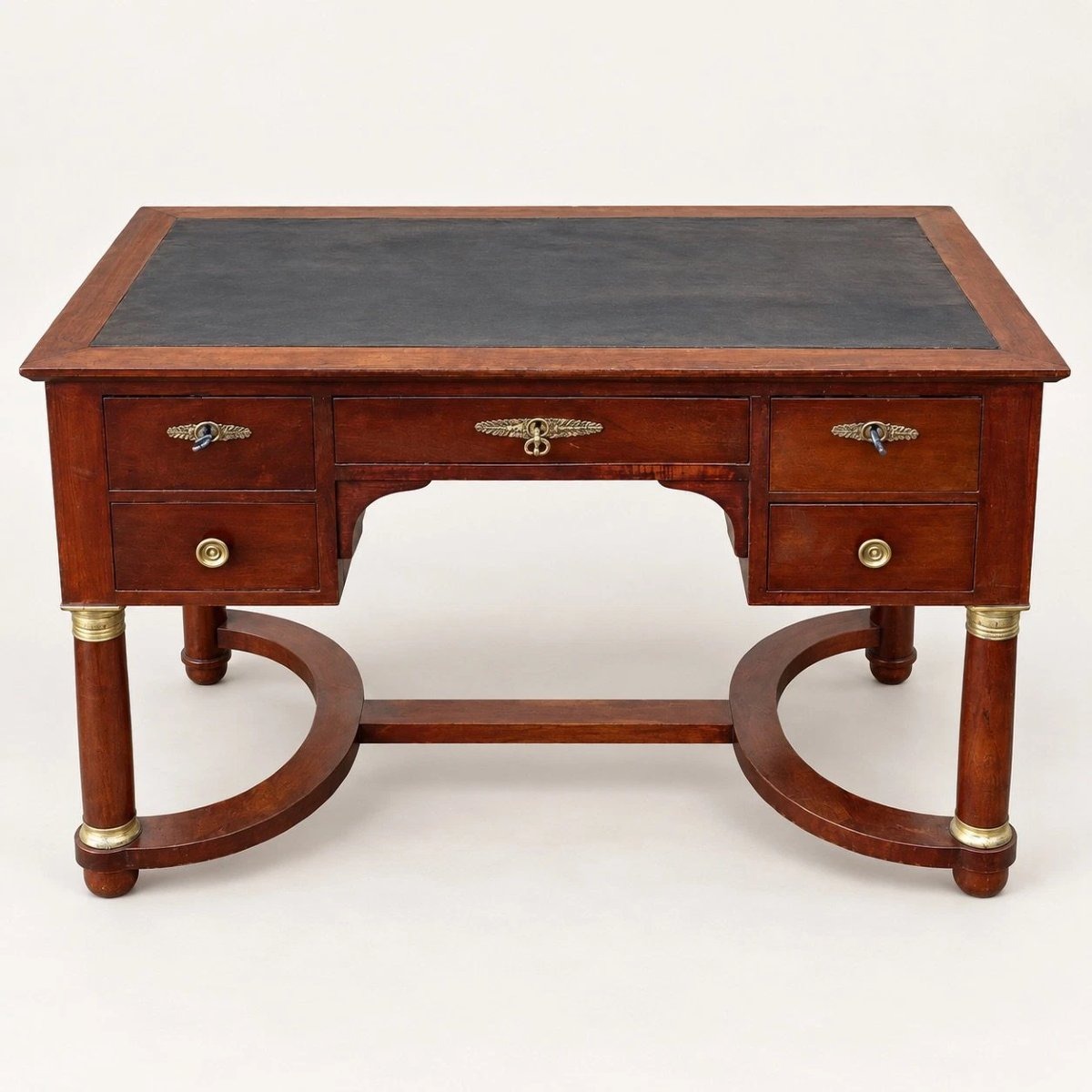 Bureau plat de style Empire en acajou