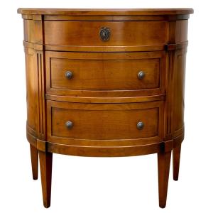 Commode demi-lune trois tiroirs en merisier Louis XVI