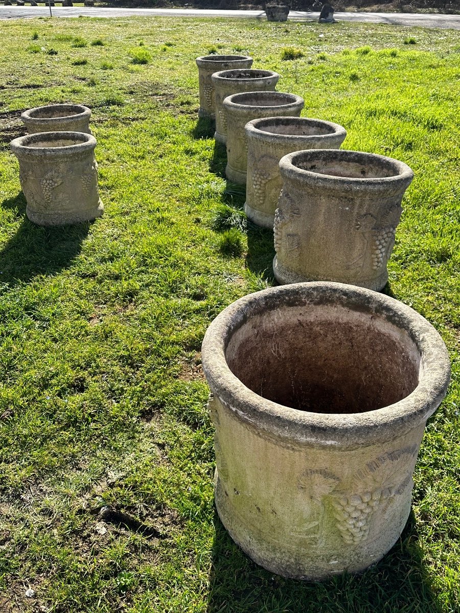 Set Of 8 Stone Vases 