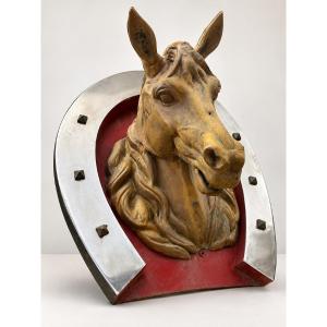 Enseigne chevaline en zinc Tête de cheval dans fer a cheval Début XX eme
