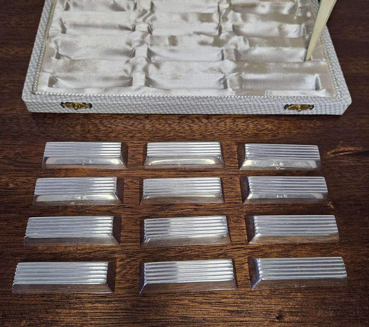 Ercuis Twelve Art Deco Silver-plated Knife Holders In Their Case.