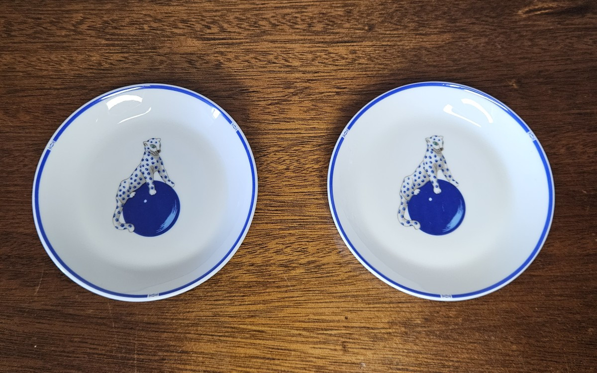 Cartier. Pair Of Porcelain Bowls. Panther Decoration On A White Background.