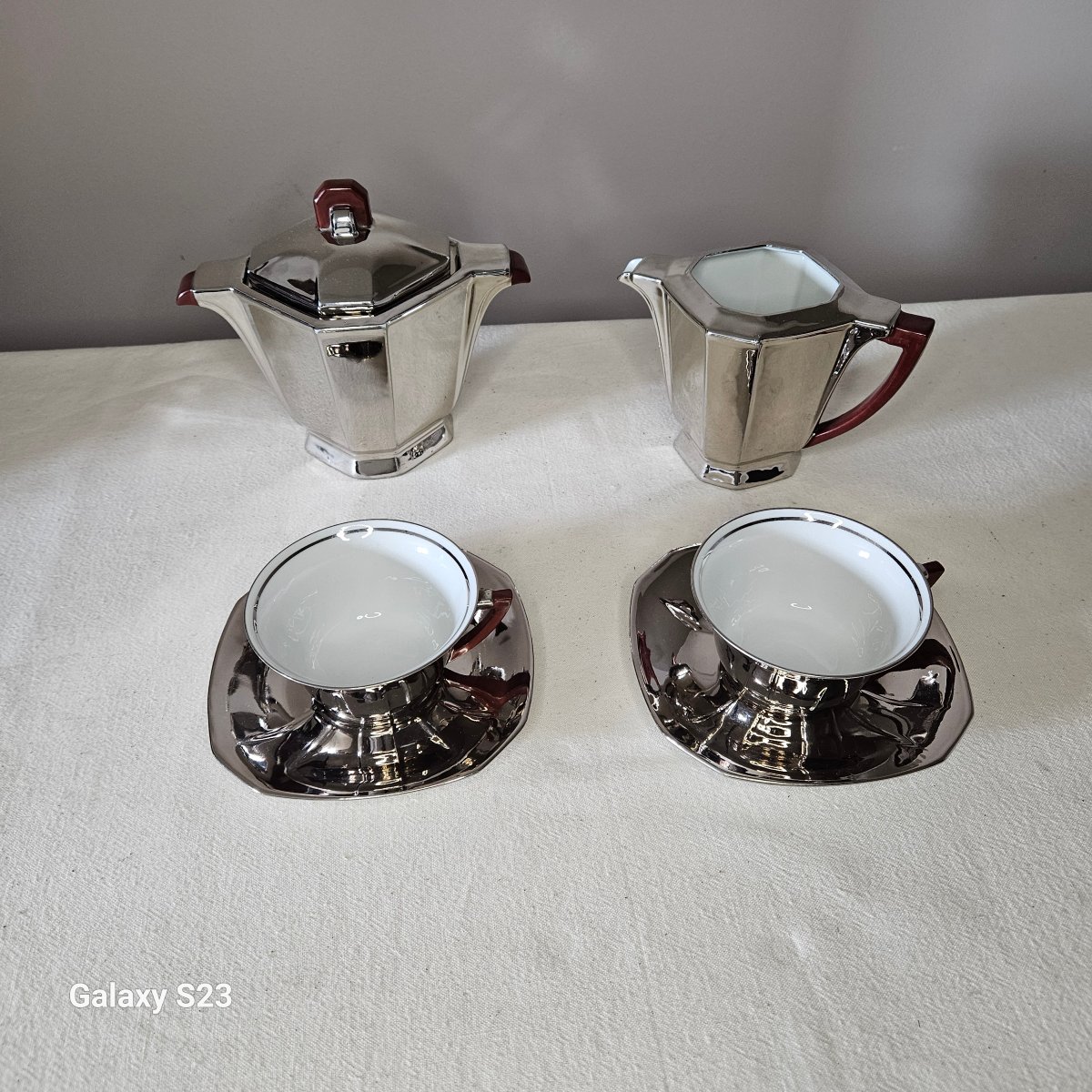 Rare tête à tête Limoges art déco décor façon métal argenté et bakélite 