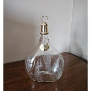 Puiforcat Carafe et son étiquette. Verre et argent poinçon minerve