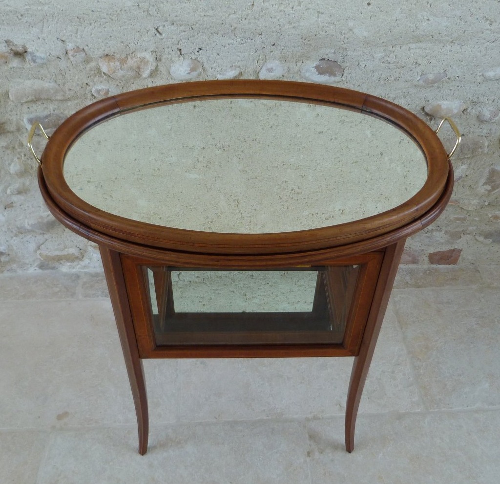 Small Tea Table That Doubles As A Display Case -photo-2