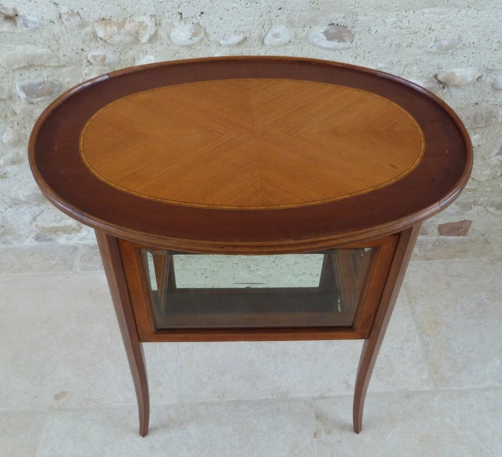 Small Tea Table That Doubles As A Display Case -photo-3