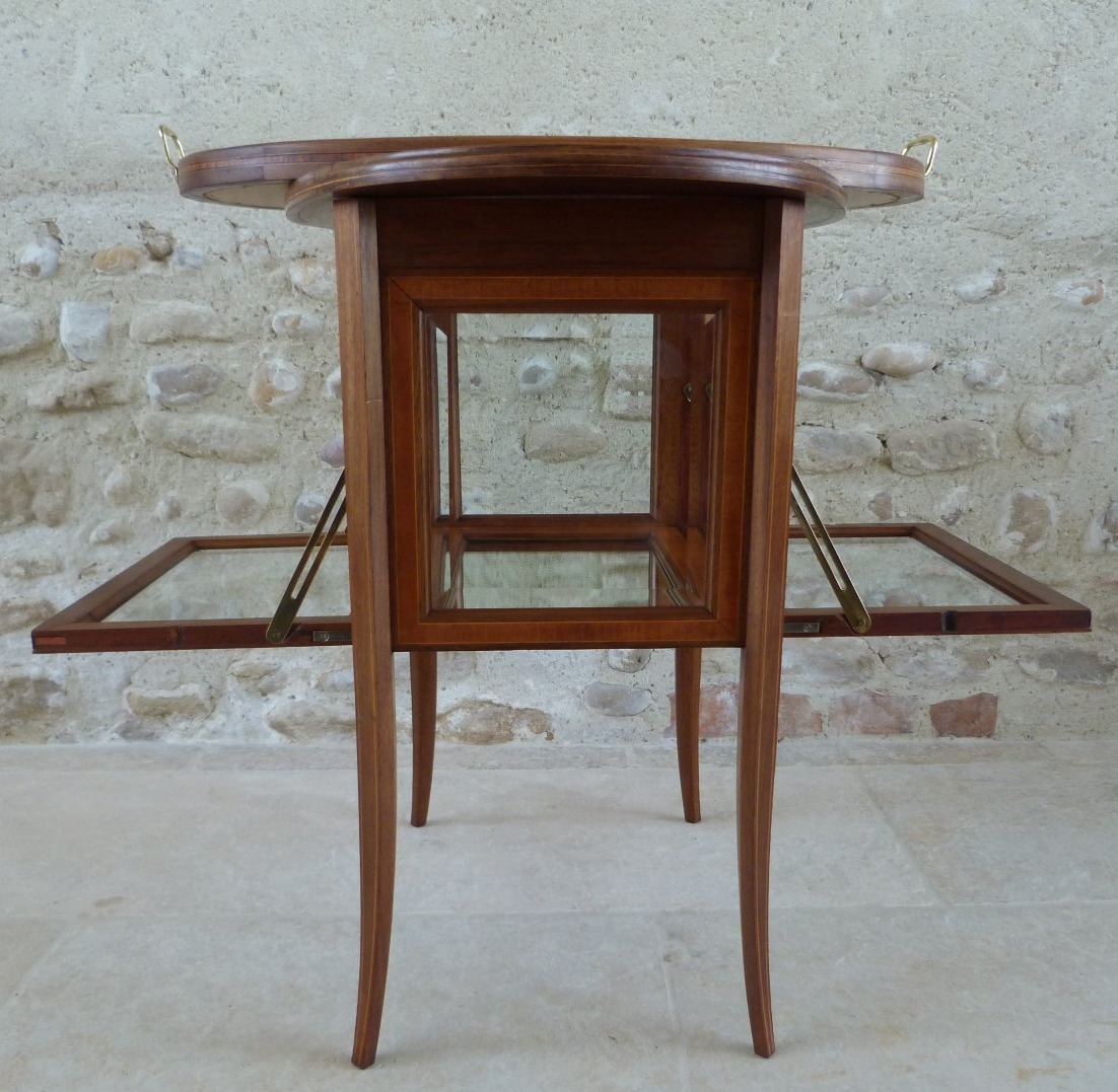 Small Tea Table That Doubles As A Display Case -photo-5
