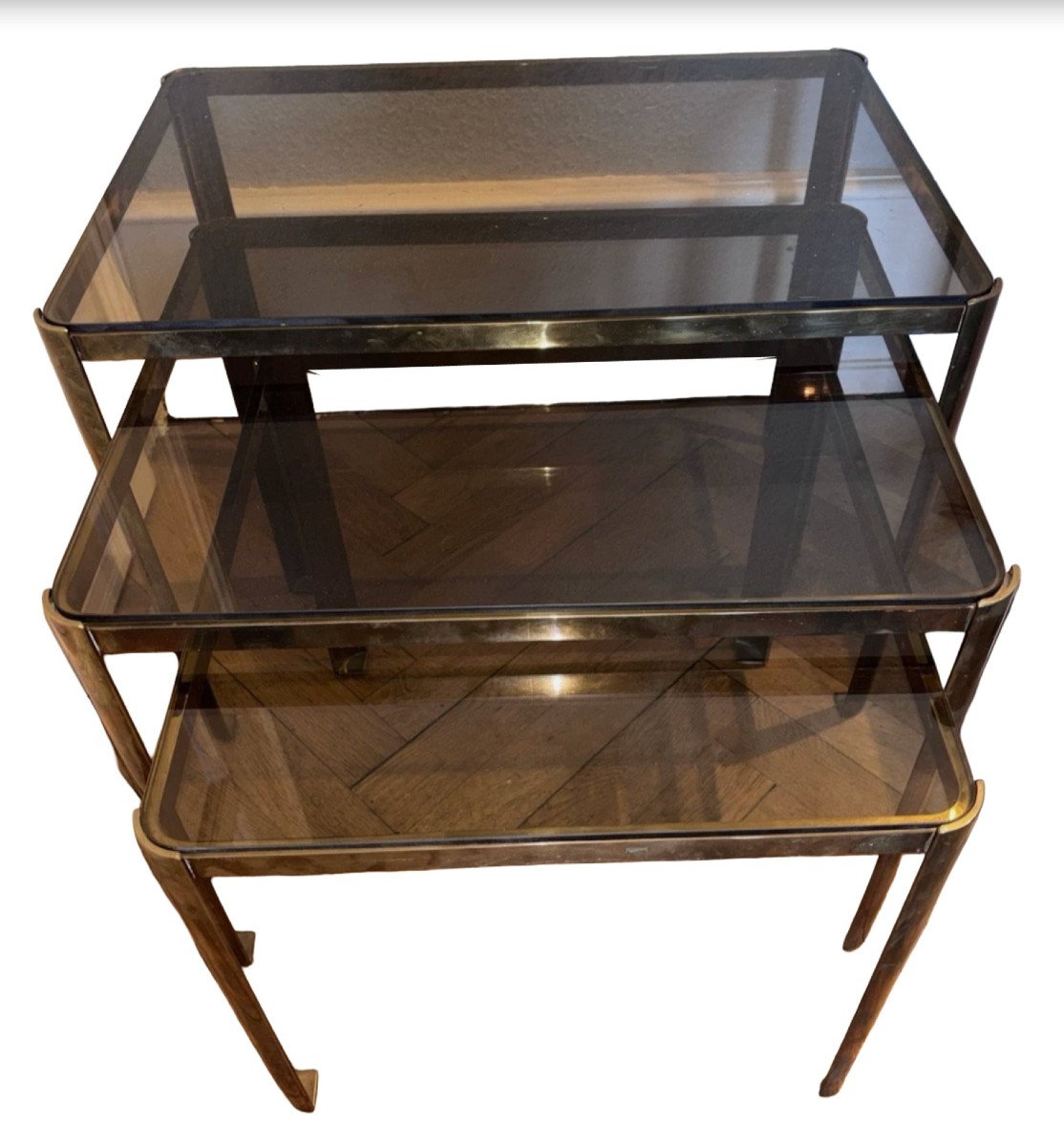 Quinet Or Pelletier Three Rectangular Nesting Tables In Gilt Bronze And Smoked Glass