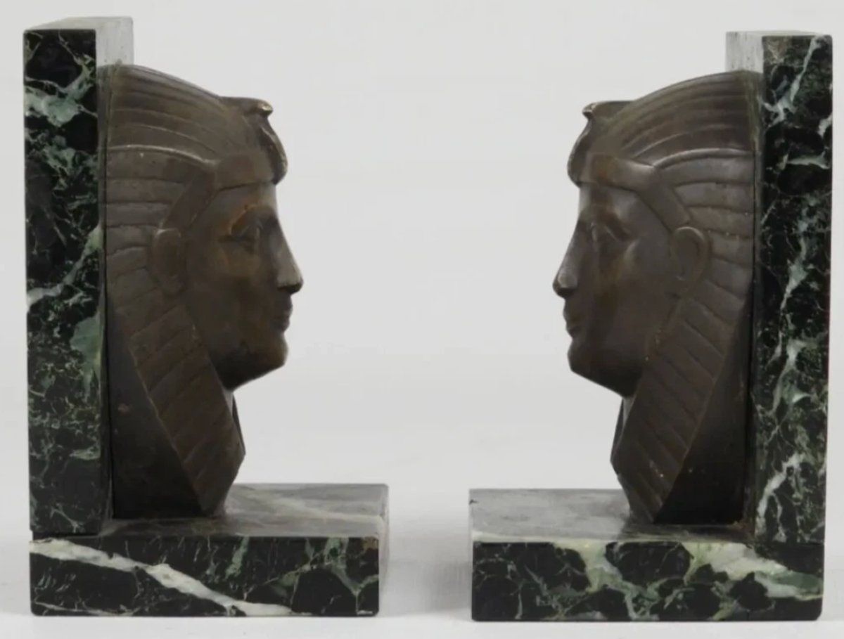 C. CHARLES Serre livres art déco bronze sur marbre représentant des visages de pharaon. Signés-photo-2