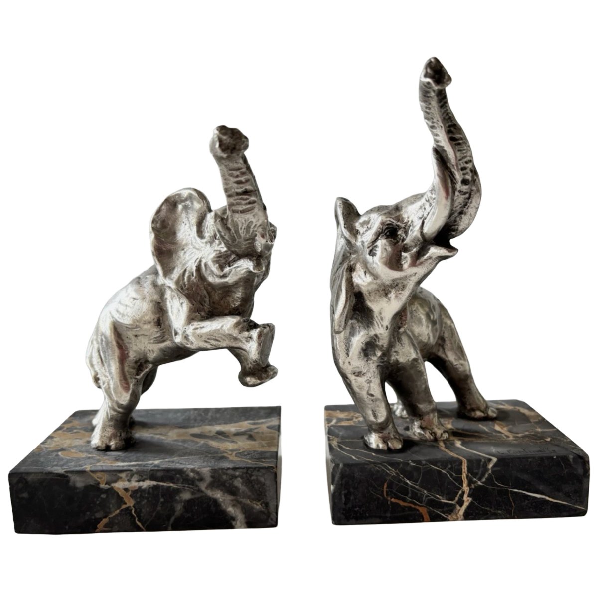 Louis FONTINELLE (1886-1964)  Serre-livres Art déco aux éléphants en bronze argenté  Signés