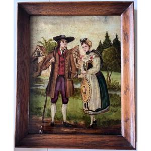 Fixed Under Framed Glass Depicting A Couple In A Village. Alsatian Naive Art