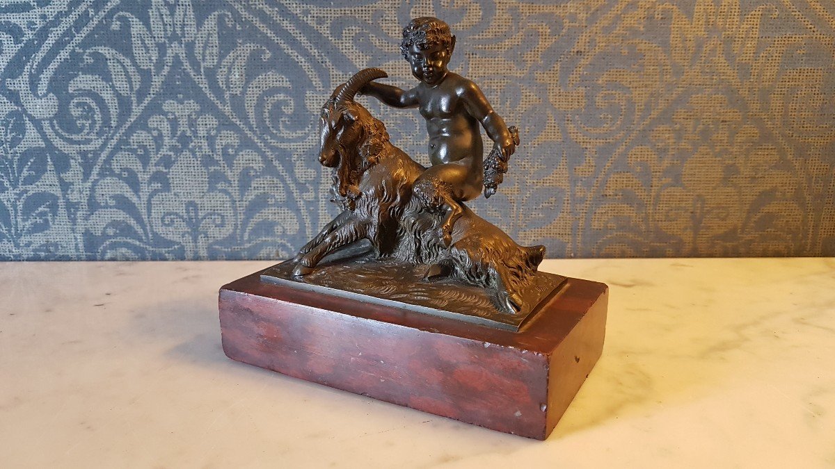 Bronze With A Red Marble Base. Representing A Satyr With A Goat.