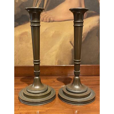 Pair Of Candlesticks In Chiselled Patinated Bronze XIXth Empire Period.