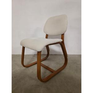 Chaises en bois courbé des années 60.