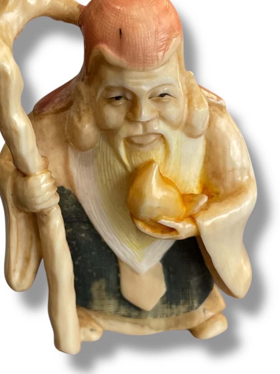 Netsuke sage tenant une pêche de longévité`-photo-1