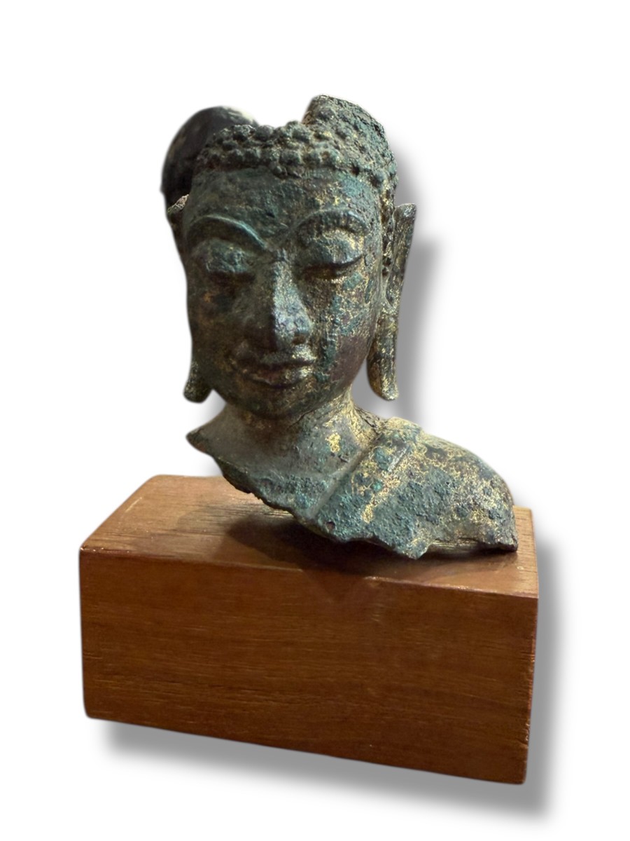 Fragment Of A Bronze Buddhist Head