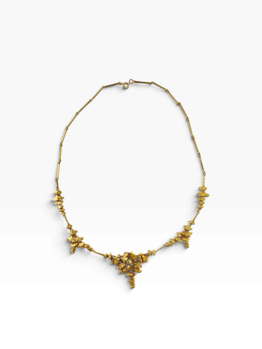 Collier draperie or motif gingko