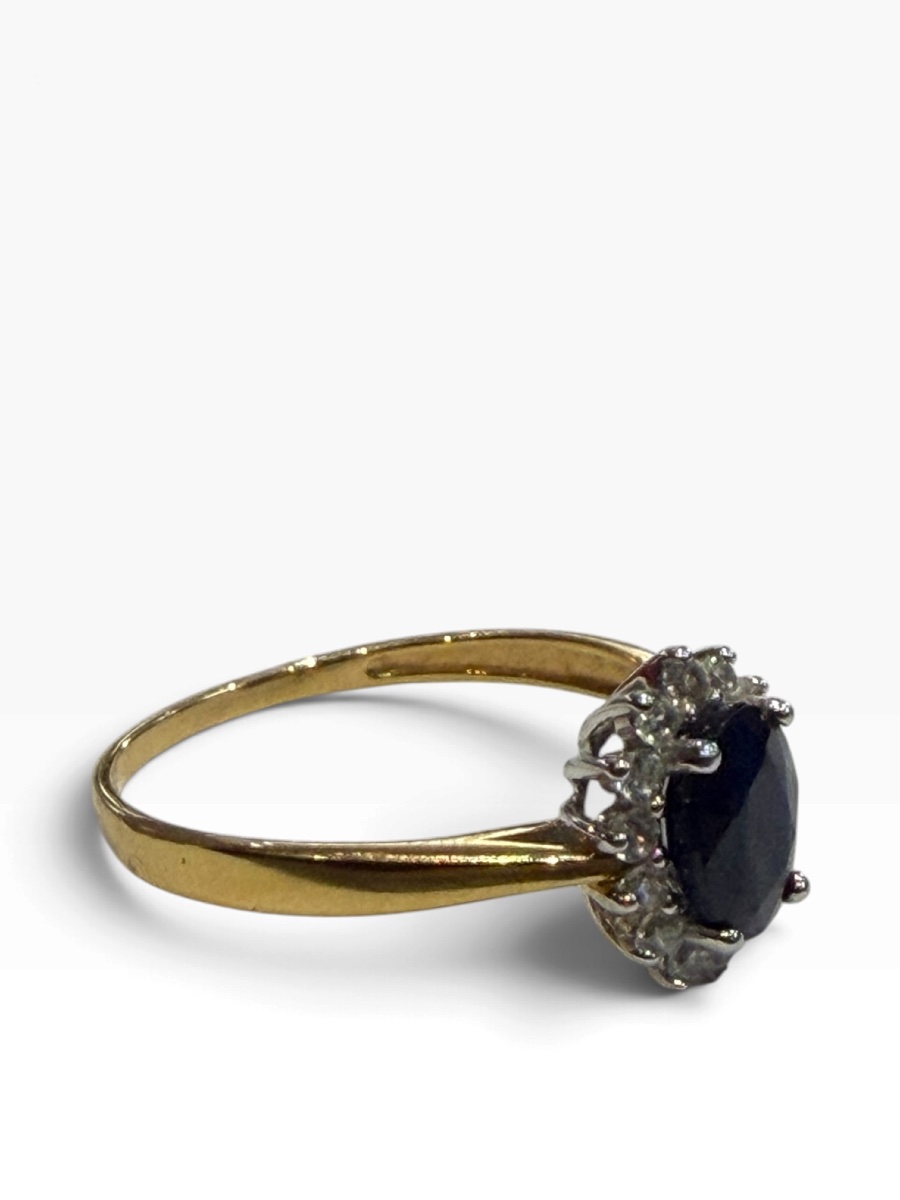Gold And Sapphire Daisy Ring