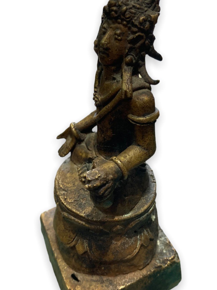 Asian Bronze, Figure Sitting On A Lotus Flower-photo-1