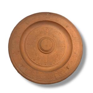Plat à la tempérance de Briot en terre cuite