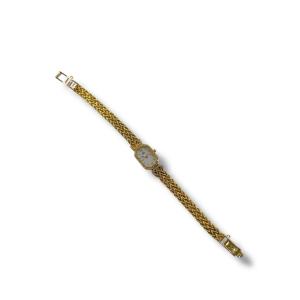 Montre de dame or 18 carats