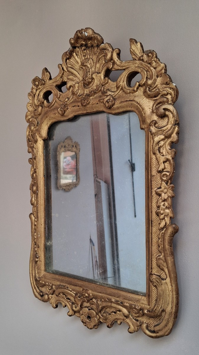 Deux miroirs en pendants