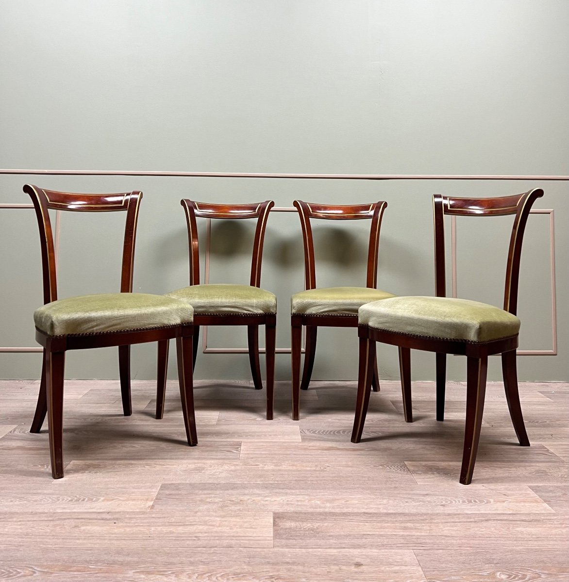 Suite Of Four Directoire Style Mahogany And Gilded Wood Chairs