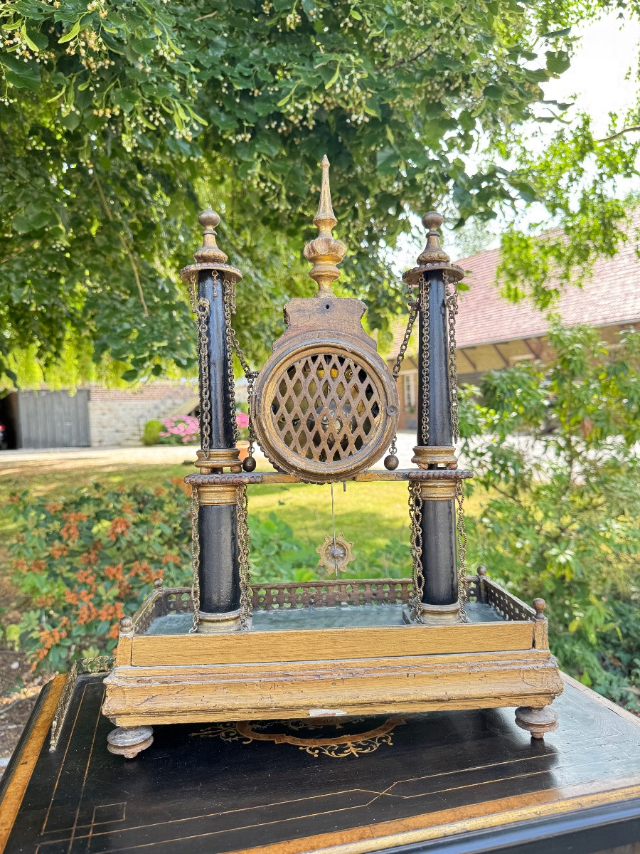 Pendule portique en bois doré et noirci d’époque Louis XVI -photo-3