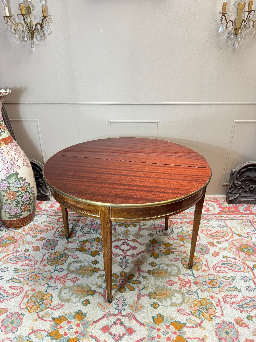 Table demi lune formant console et table de salle à manger en acajou de style Louis XVI.-photo-2