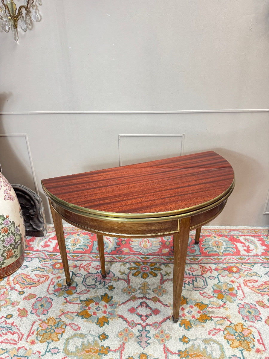 Table demi lune formant console et table de salle à manger en acajou de style Louis XVI.-photo-4
