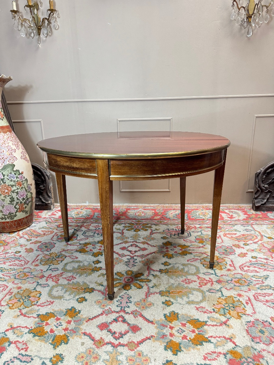 Table demi lune formant console et table de salle à manger en acajou de style Louis XVI.-photo-1