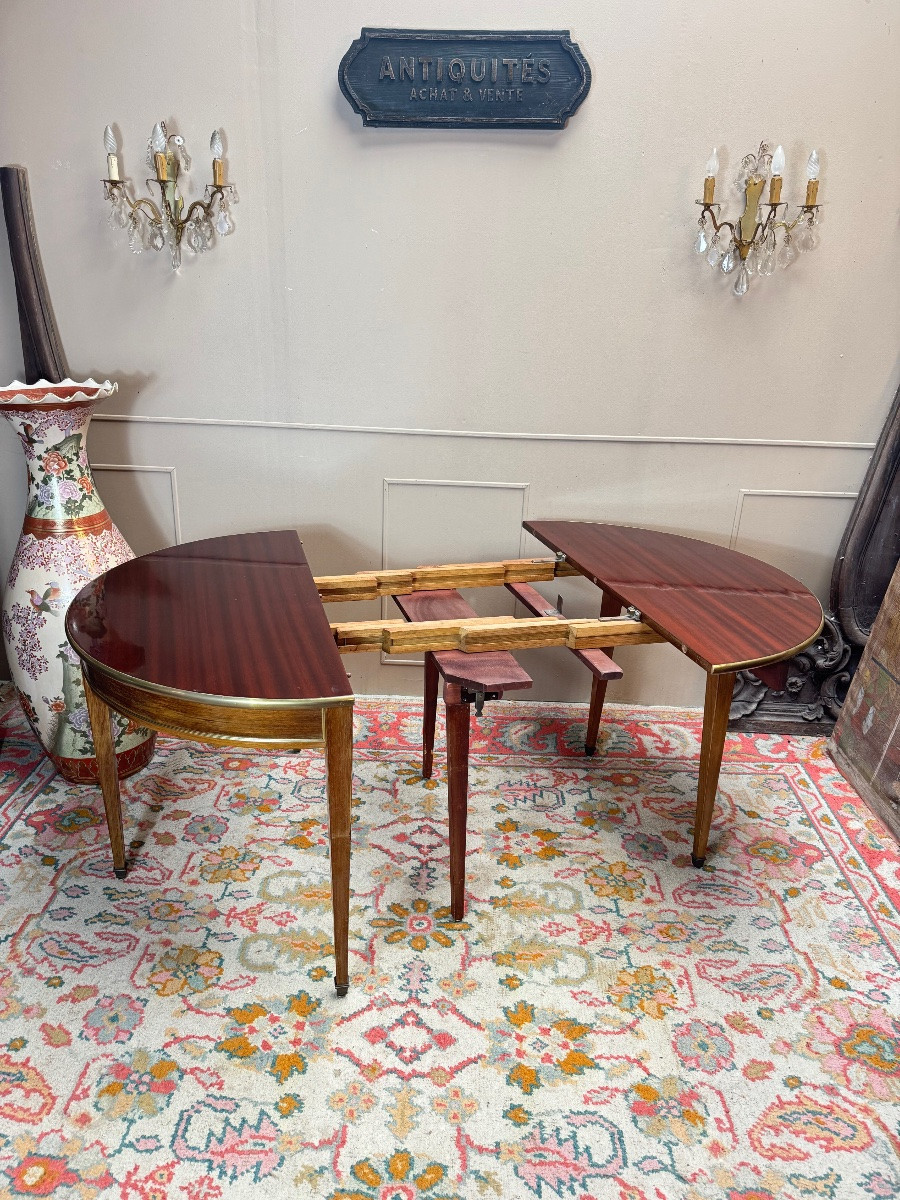 Table demi lune formant console et table de salle à manger en acajou de style Louis XVI.-photo-3