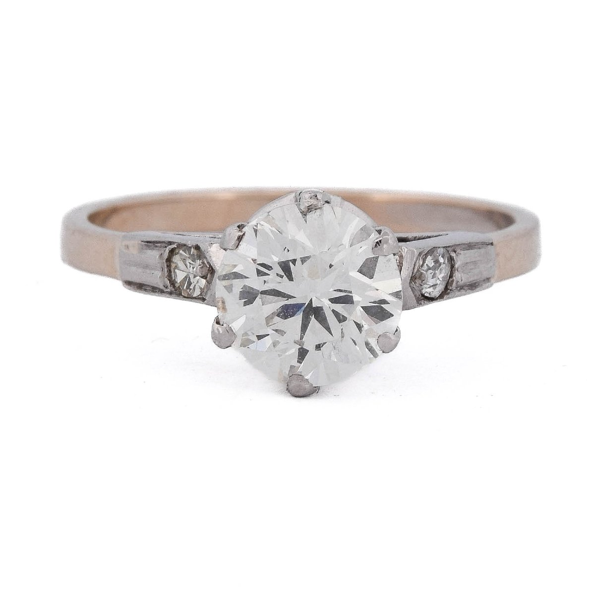 Bague des années 1940 en platine et or rose 18 carats, diamant taille ancienne de 1,50 ct