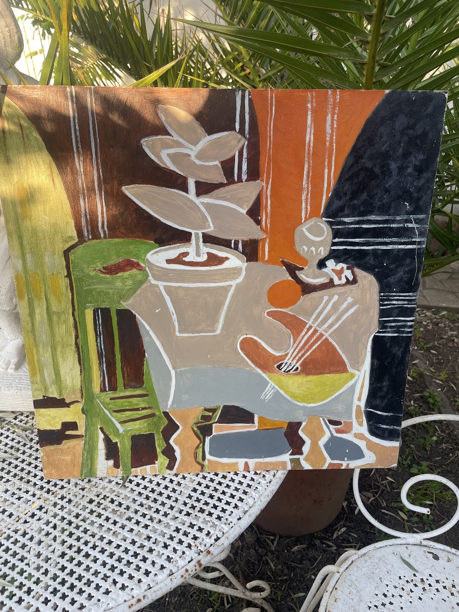 The Painter's Palette And His Green Plant -photo-1