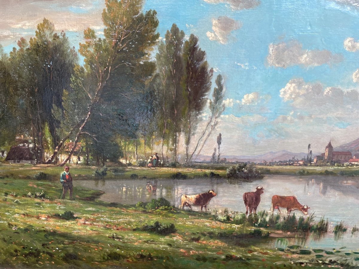Farmer And Cows By The Pond-photo-2