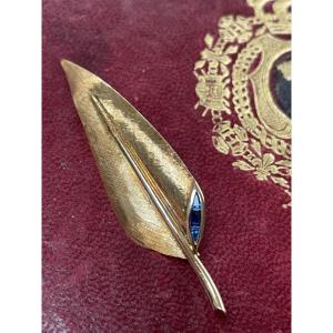 Broche feuille or et saphirs 