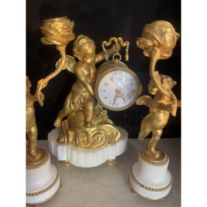 Pendule et ses candélabres LXVI 