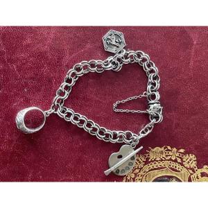 Gourmette argent et breloques