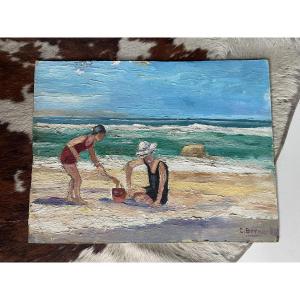 Mother And Child On Claude Bernard Beach