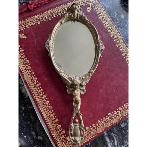 Miroir face à main bronze doré