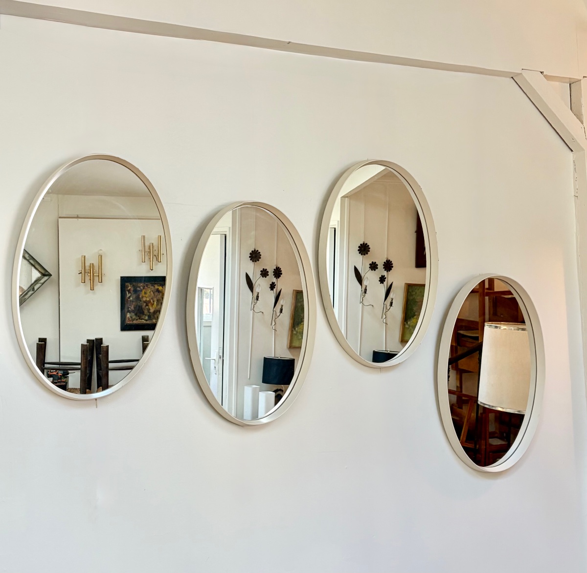 Set Of 4 Oval Mirrors Made Of White-lacquered Wood, Circa 1970.