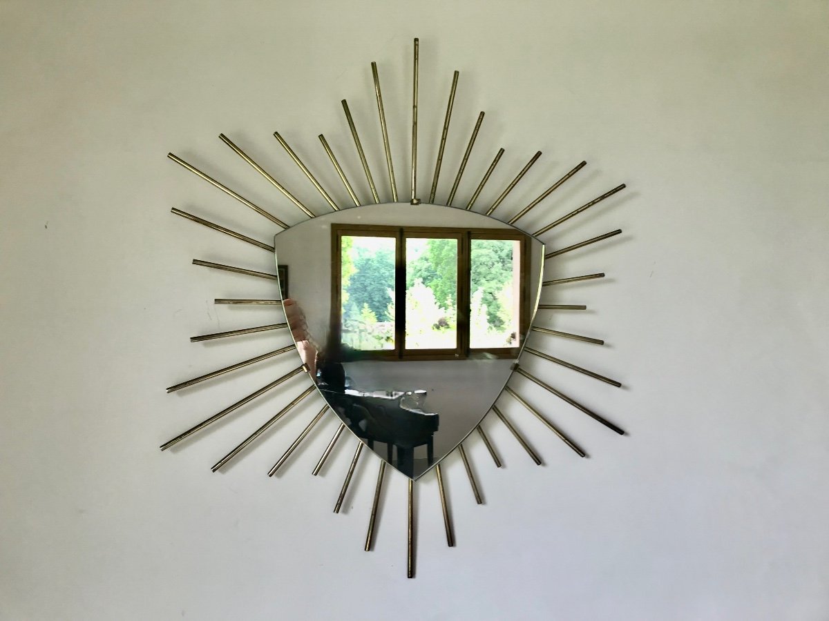 Miroir soleil en métal doré 68cm.