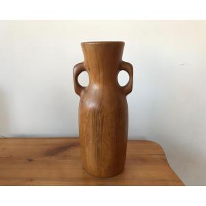 Vase pique-fleurs en bois d'olivier.