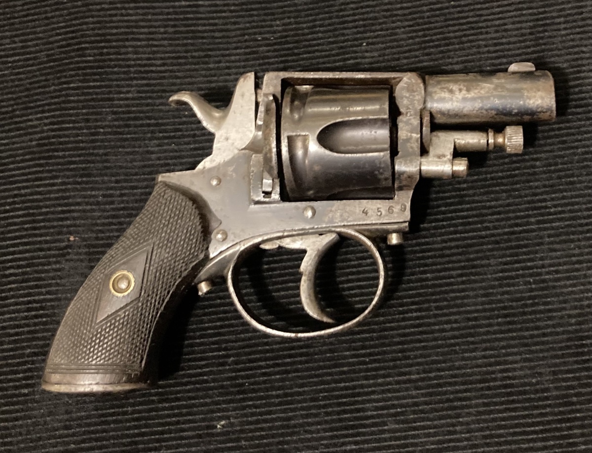 Five-shot Revolver; .320 Caliber; Centerfire. Closed Frame, Bronzed Finish.